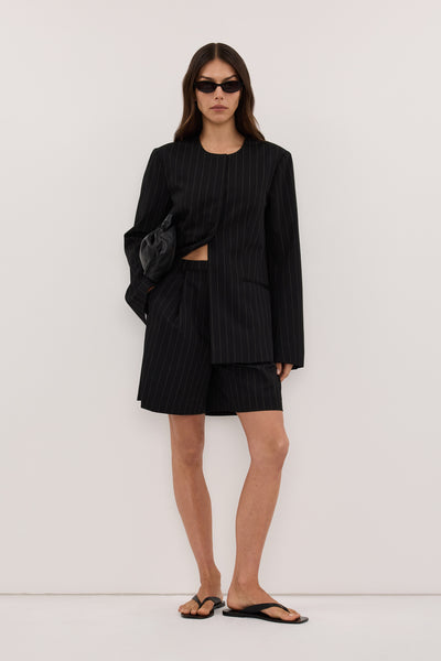 Helena  wearing SIAN BLACK PINSTRIPE RELAXED BLAZER