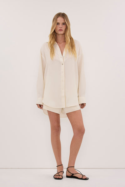 Zoe wearing CALIA CREAM RELAXED SHIRT