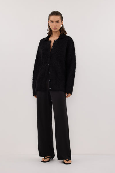 Stas wearing SALMA BLACK POLO NECK KNIT CARDIGAN