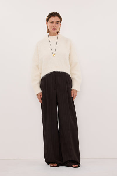 Joanna wearing SALMA IVORY TUCK SLEEVE JUMPER