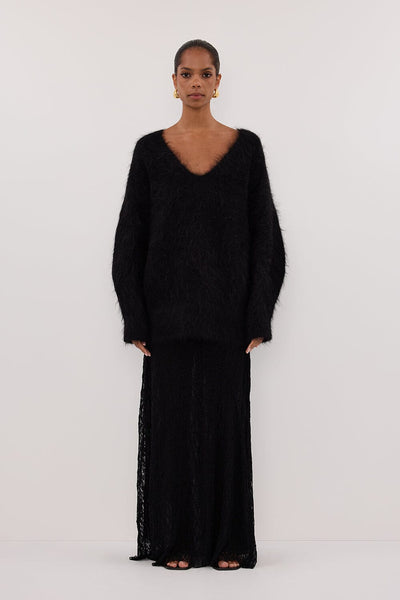 Kristen wearing SALMA BLACK V NECK JUMPER