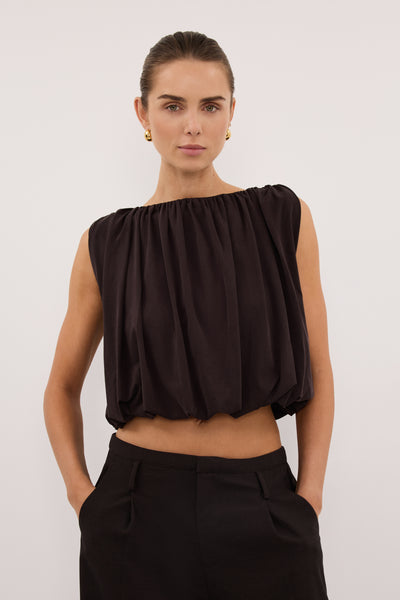 Stas wearing AVA BURNT CHOC SLEEVELESS MODAL BLEND TOP
