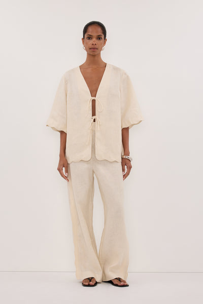 Kristen wearing LELA SANDSTONE SHORT SLEEVE LINEN SHIRT