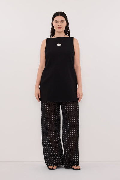 Jasmine wearing ROWIE BLACK SLEEVELESS BOAT NECK TUNIC TOP
