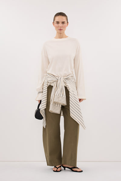 Stas wearing SLOANE CREAM LONG SLEEVE CREW KNIT TOP