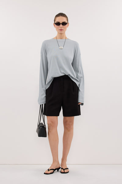 Stas wearing SLOANE MINERAL LONG SLEEVE CREW KNIT TOP
