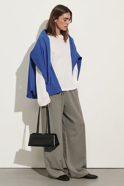 Sofia wearing SLOANE WHITE LONG SLEEVE CREW KNIT TOP
