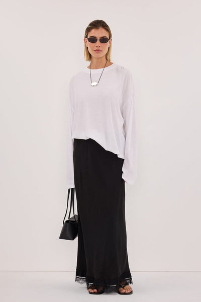 Joanna wearing SLOANE WHITE LONG SLEEVE CREW KNIT TOP