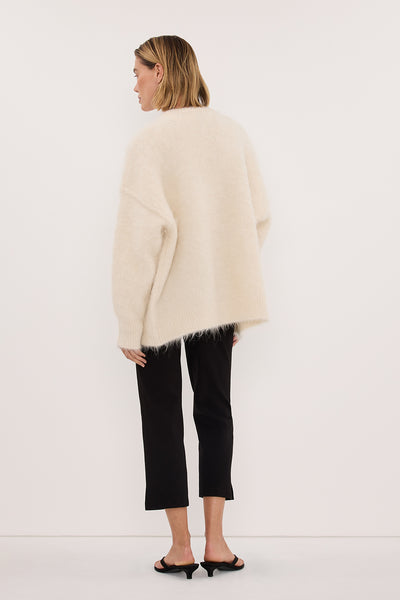 Joanna wearing SALMA IVORY LONGLINE CARDIGAN