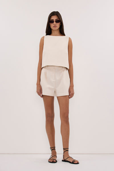 Aida wearing ROSALIE CREAM MARLE SHELL TOP