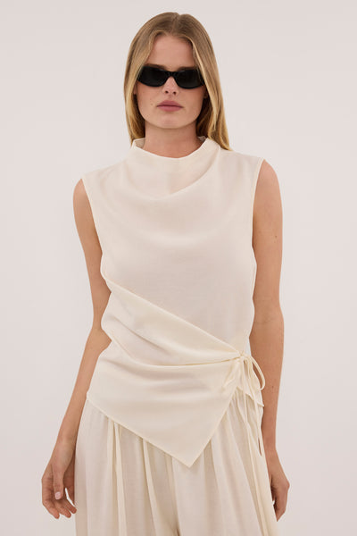 Zoe wearing CALIA CREAM TIE TOP