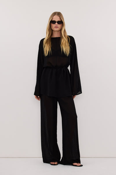 Zoe wearing SALINA BLACK DOT DRAPED TOP