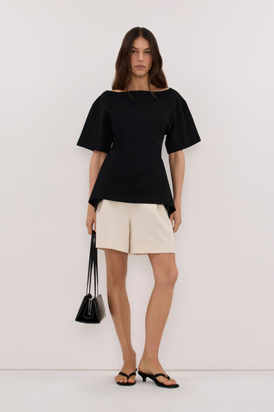 Helena  wearing VERA BLACK HANDKERCHIEF HEM TEE