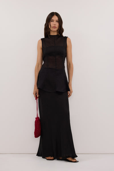 Helena  wearing TASH BLACK RAMIE FUNNEL NECK TOP