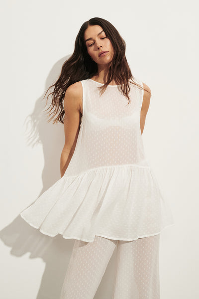 Helena  wearing SALINA IVORY DOT DROP WAIST TOP
