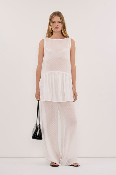 Zoe wearing SALINA IVORY DOT DROP WAIST TOP