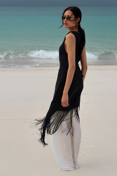 Ploy wearing FIORA BLACK FRINGE ASYM TOP
