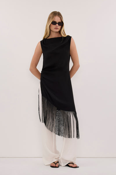 Zoe wearing FIORA BLACK FRINGE ASYM TOP