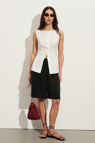 Helena  wearing SCOTTIE WHITE SLEEVELESS COTTON TOP