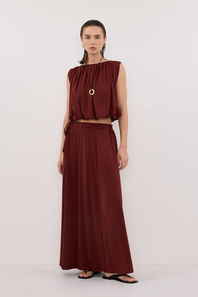 Stas wearing AVA SAHARA MODAL BLEND MIDI SKIRT