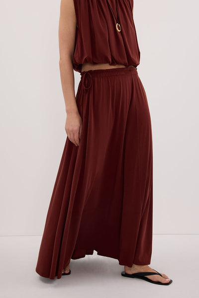 Cynthia wearing AVA SAHARA MODAL BLEND MIDI SKIRT