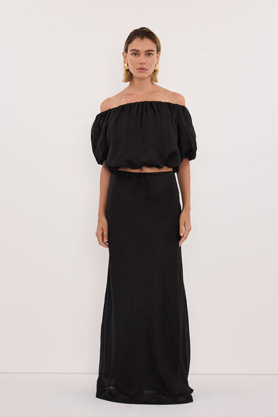 Joanna wearing MAISON BLACK RAMIE BIAS MAXI SKIRT