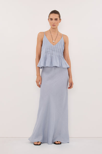 Stas wearing MAISON DUSTY BLUE RAMIE BIAS MAXI SKIRT