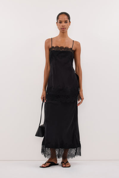 Anaya  wearing MINA BLACK CUPRO LACE MIDI SKIRT