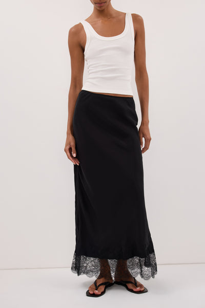 Kristen wearing MINA BLACK CUPRO LACE MIDI SKIRT