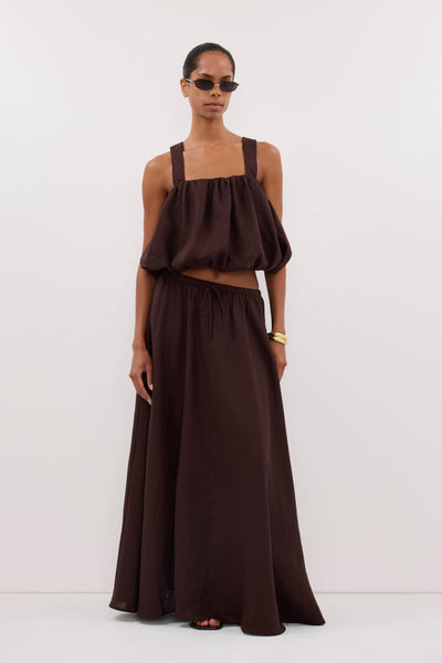Kristen wearing RAVELLO BURNT CHOC LINEN MIDI SKIRT