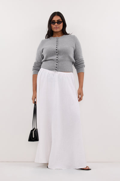 Shanaya wearing RAVELLO WHITE LINEN MIDI SKIRT