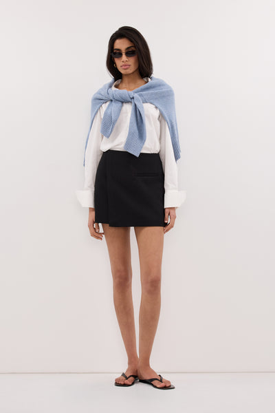 Anaya  wearing DANICA BLACK ASYM WRAP SKORT