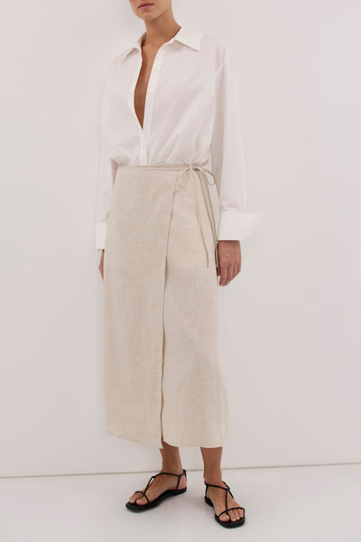 Aude wearing ODETTE NATURAL LINEN WRAP MIDI SKIRT