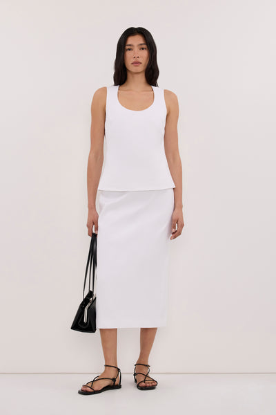 Zoey wearing AURELI WHITE LINEN PENCIL MIDI SKIRT
