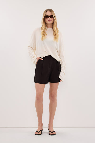 Zoe wearing MONIQUE PEAT CHOC TAILORED SHORT