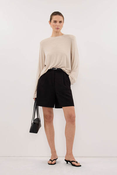 Stas wearing SOLENE BLACK BERMUDA SHORT