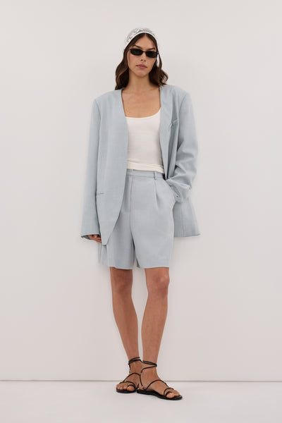 Helena  wearing HALINA MINERAL BLUE TAILORED BERMUDA SHORT - PRE ORDER