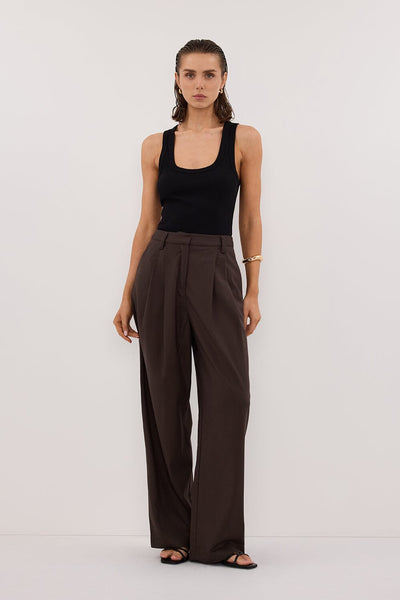 Stas wearing EDEN BITTER CHOC TAILORED PANT