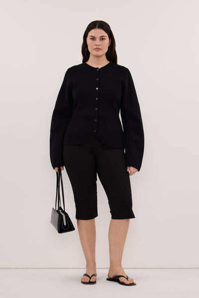 Jasmine wearing DEMI BLACK CAPRI PANT