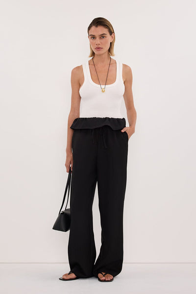 Joanna wearing CYRUS BLACK FISHERMAN PANT