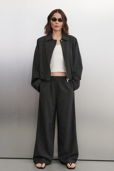 Bambi wearing MARCO GREY PLAID ELASTIC PANT
