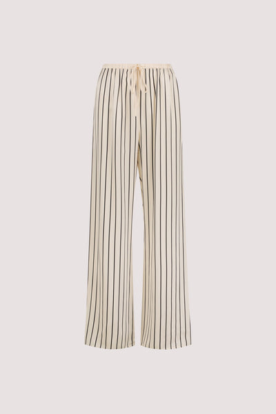 Aude wearing ADRIENNE CREAM STRIPE SILK PANT