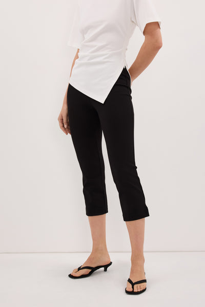 Stas wearing DEMI BLACK 7/8 CAPRI PANT