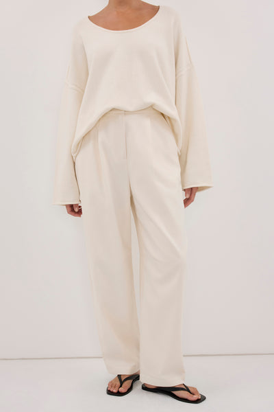 Aude wearing CAMILLE CREAM TWILL BARREL LEG PANT
