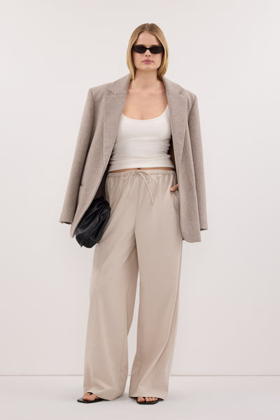 Zoe wearing VIANNA BONE MARLE ELASTICATED DRAWSTRING PANT