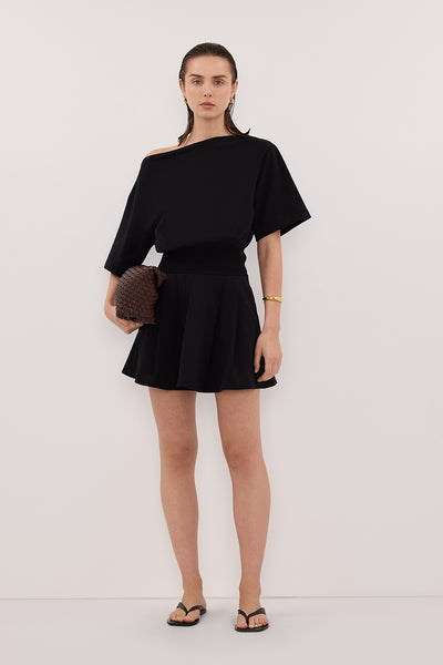 Stas wearing ESME BLACK ASYM MINI DRESS
