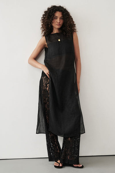 Carol wearing KAI BLACK SLEEVELESS RAMIE TUNIC TOP