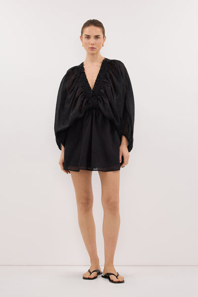 Stas wearing BRIELLE BLACK RAMIE MINI DRESS