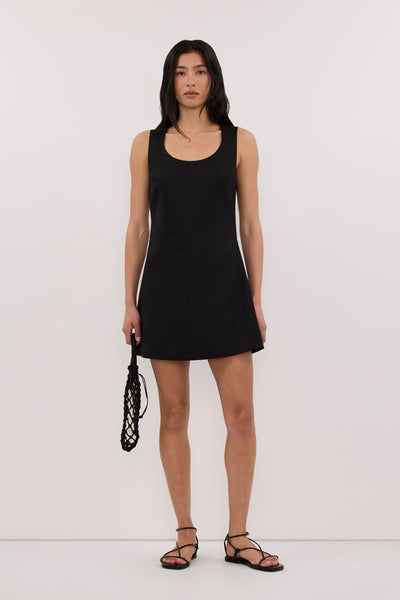 Zoey wearing AURELI BLACK LINEN MINI DRESS