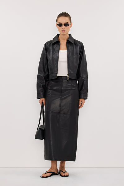 Stas wearing COOPER BLACK LEATHER MIDI SKIRT